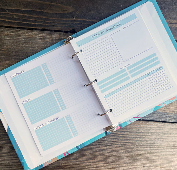 Custom printed planner in a binder.